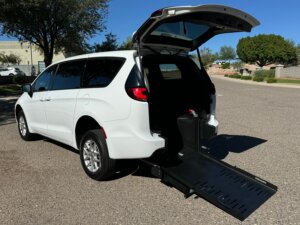 White Chrysler Pacifica with FR Conversions Rear Entry Manual Fold Out conversion