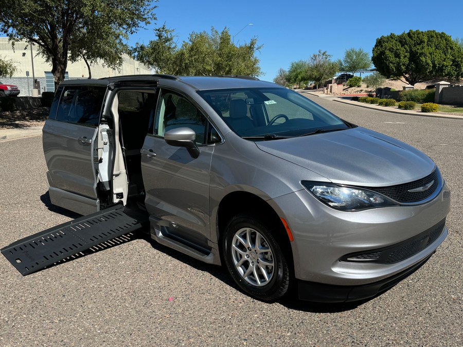 Silver Chrysler Voyager with BraunAbility Side Entry Automatic Fold Out conversion