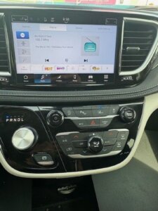 Red Chrysler Pacifica with Driverge Side Entry Automatic Fold Out conversion
