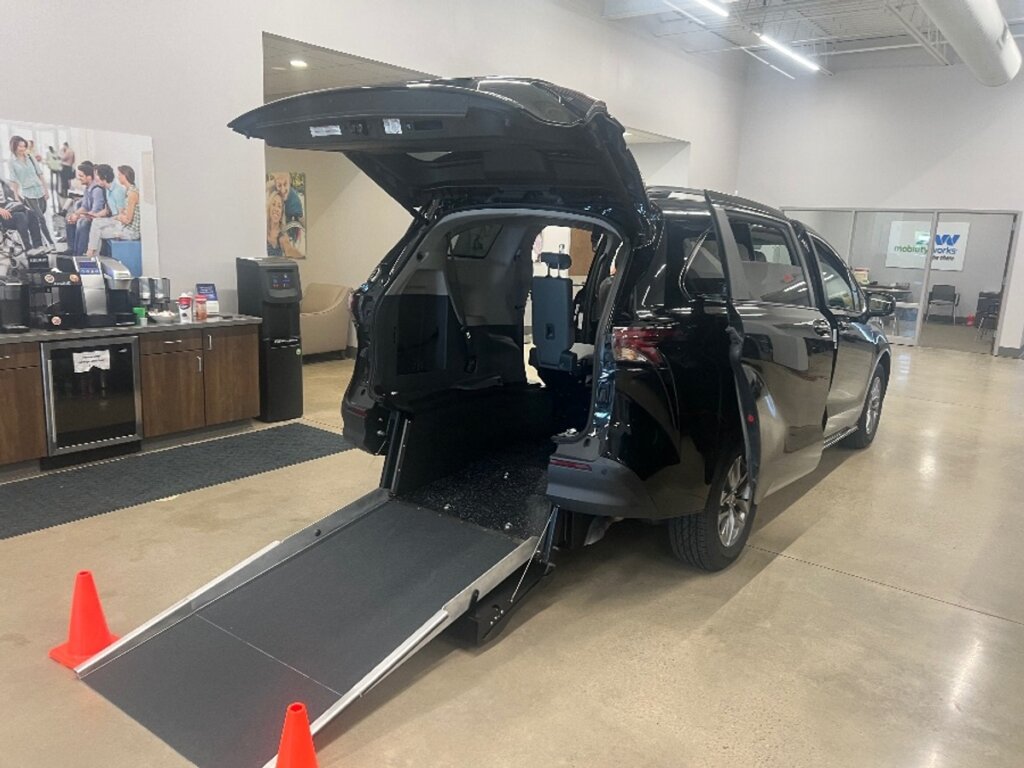 Black Toyota Sienna with Driverge Rear Entry Manual Fold Out conversion