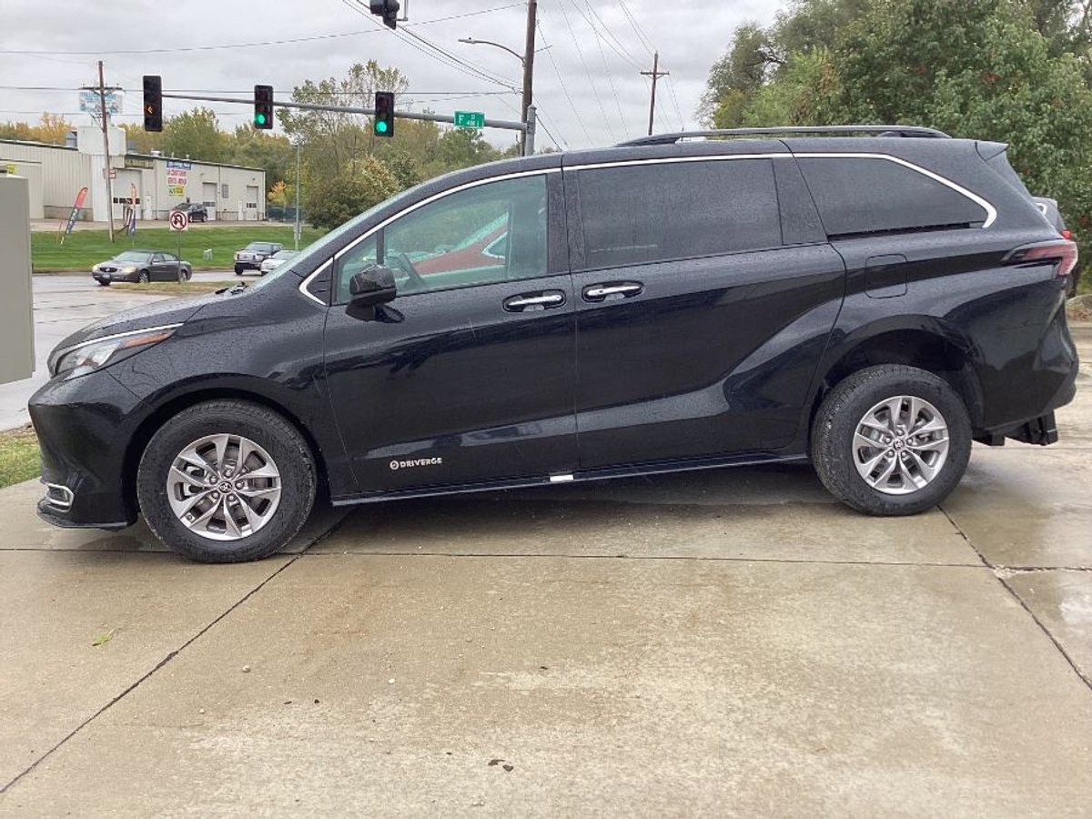 Black Toyota Sienna with Driverge Rear Entry Manual Fold Out conversion
