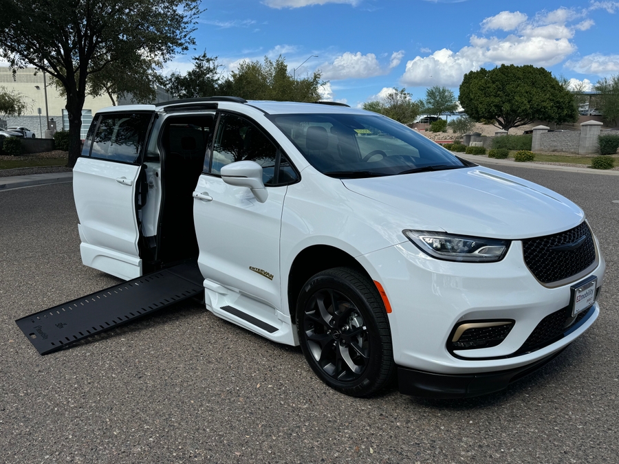 White Chrysler Pacifica with BraunAbility Side Entry Automatic In Floor conversion