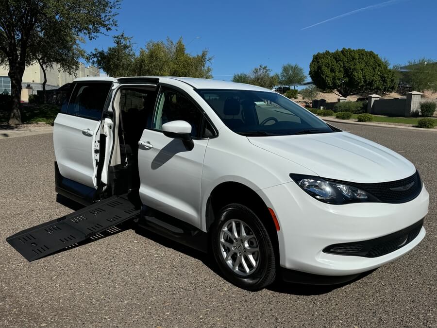 White Chrysler Voyager with Vantage Mobility Side Entry Automatic Fold Out conversion