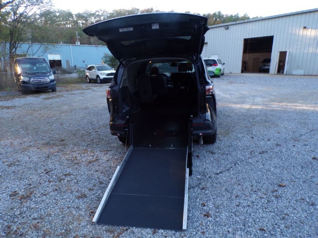 Black Toyota Sienna with Driverge Rear Entry Manual Fold Out conversion