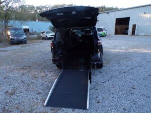Black Toyota Sienna with Driverge Rear Entry Manual Fold Out conversion