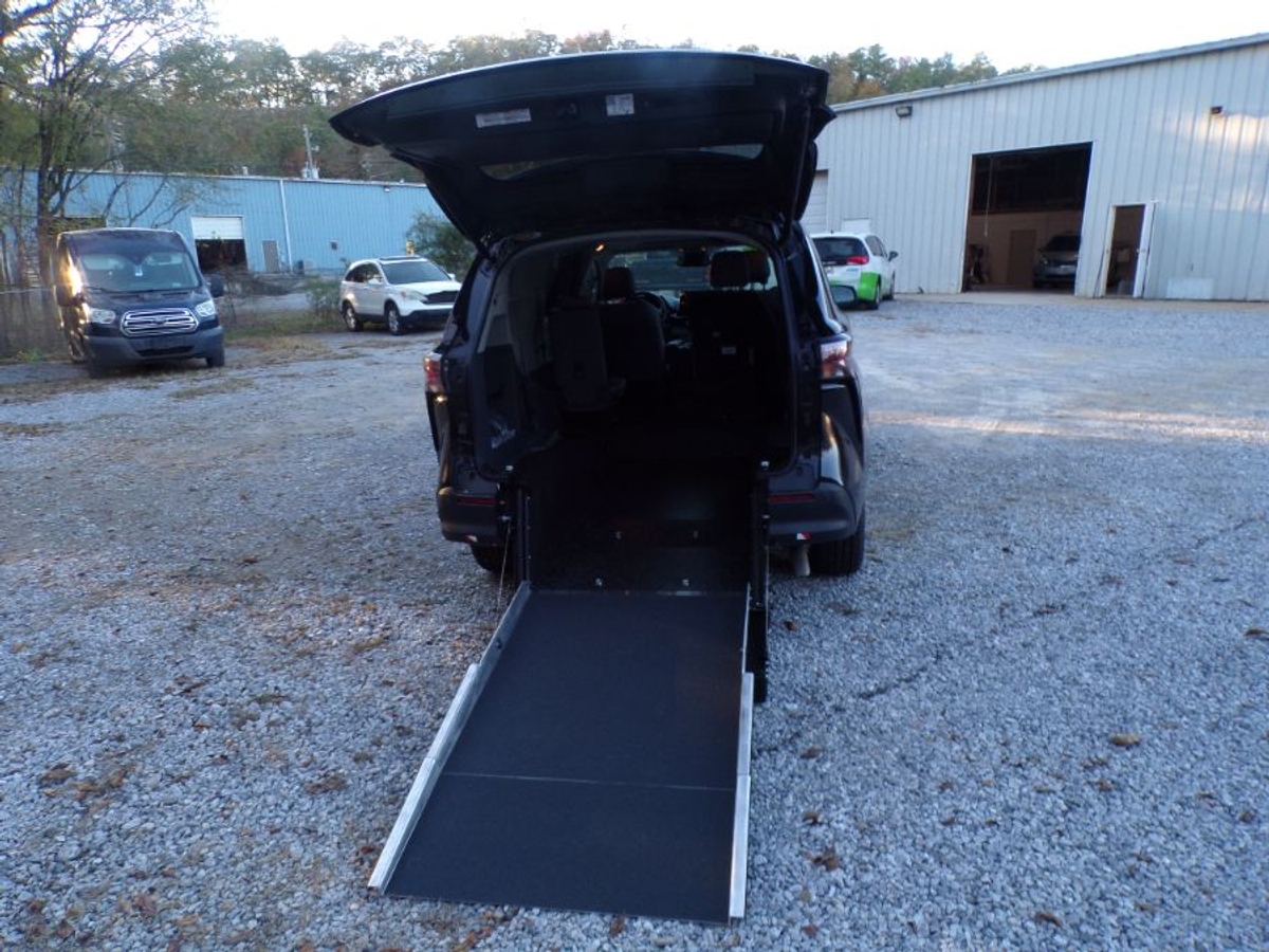 Black Toyota Sienna with Driverge Rear Entry Manual Fold Out conversion