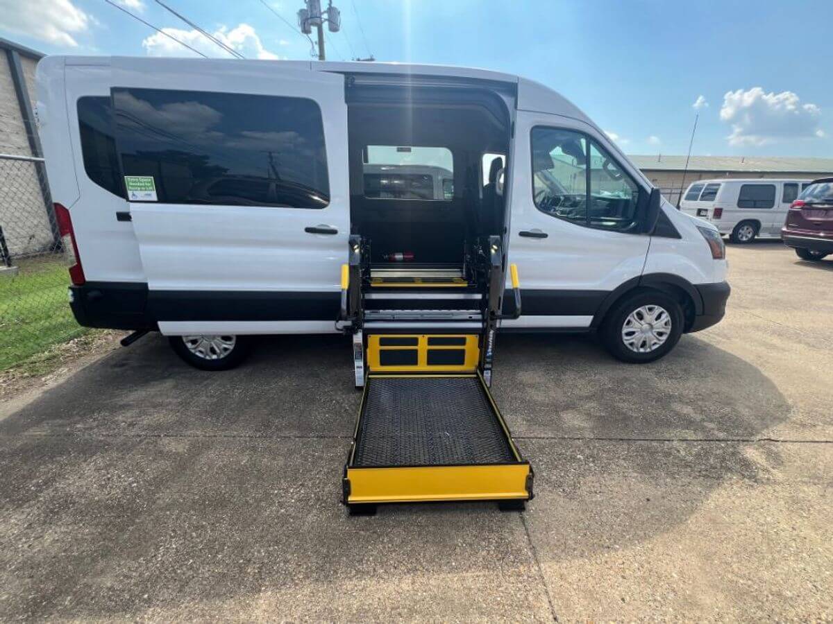 White Ford T350 with Driverge Side Entry Automatic Fold Out conversion