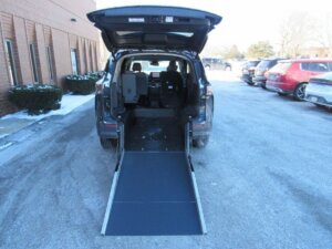 Black Toyota Sienna with Driverge Rear Entry Manual Fold Out conversion