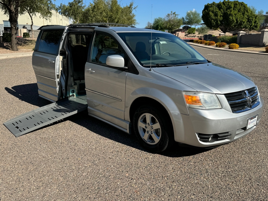 Silver Dodge Grand Caravan with BraunAbility Side Entry Automatic Fold Out conversion