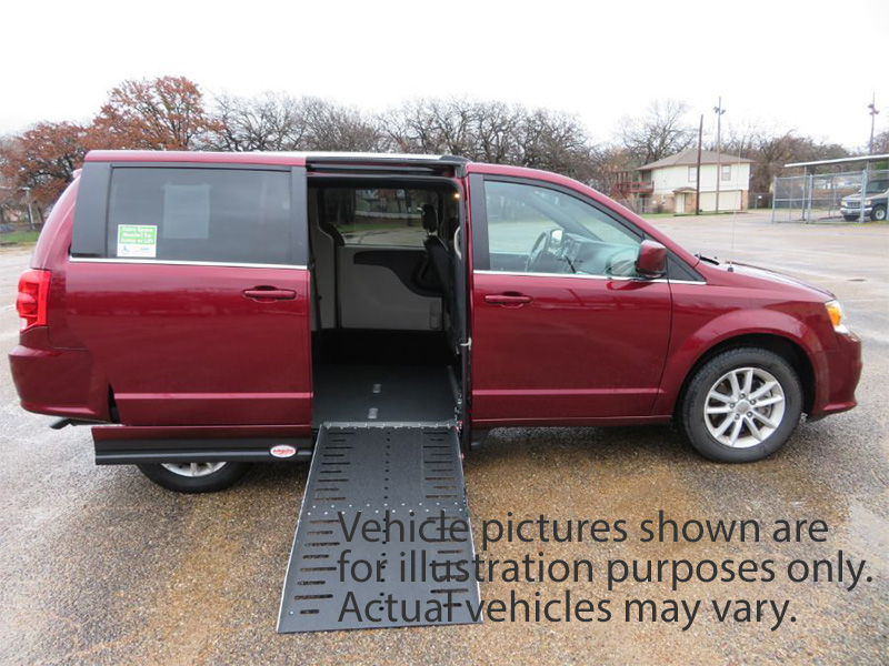 White Dodge Grand Caravan with Adaptive Vans Side Entry Automatic Fold Out conversion